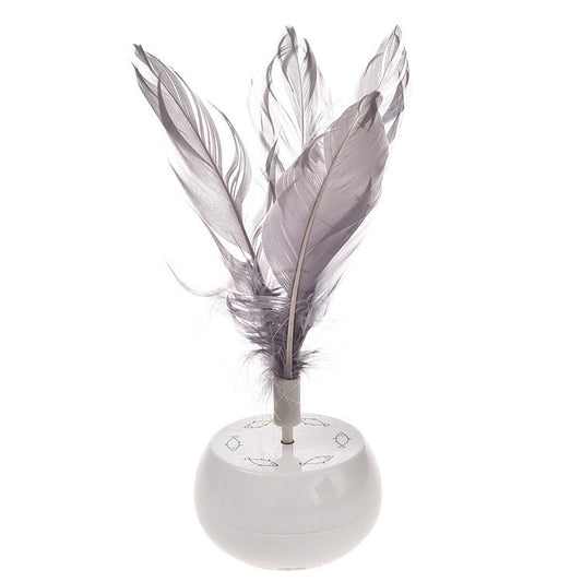 Electric pet tumbler feather cat toy spinning and balancing on indoor floor