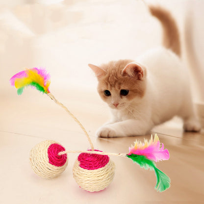 Sisal feather shuttlecock cat toy rolling on hardwood floor for cat play